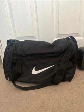 Nike Small Black Duffel Bag with White Swoosh - Men's Travel & Gym